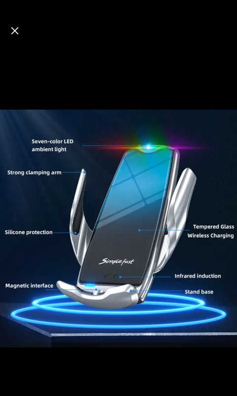 Ein Smartphone ruht im HandyOase Unisersal Wirless Kfz-Simple Fast 10W, einem silbernen kabellosen Ladegerät mit magnetischer Halterung, 360°-Drehung, LED-Umgebungslicht, Klemmarm, Silikonschutz, magnetischer Schnittstelle & Infrarot-Induktion.